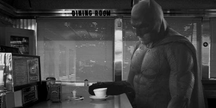 Batflek alone in a diner